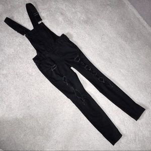 Black distressed overalls
